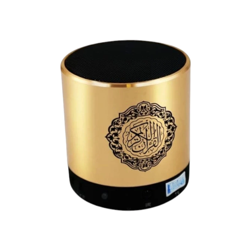 سماعة إلكترونية ذهبية مزخرفة بعبارة "القرآن الكريم"، مع شاشة رقمية، معروضة على منصة خشبية وخلفية بنية مزخرفة بزخارف إسلامية، يظهر شعار "THE BIG OFFER".