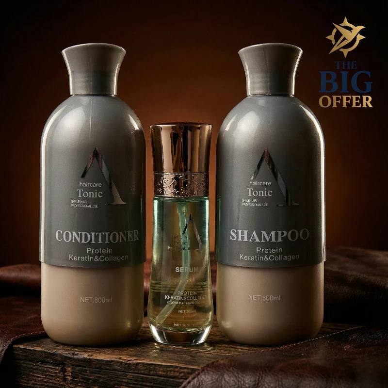 ثلاث عبوات من منتجات العناية بالشعر من Tonic تحتوي على شامبو، بلسم، وسيروم بالبروتين والكيراتين والكولاجين، موضوعة على سطح خشبي داكن.